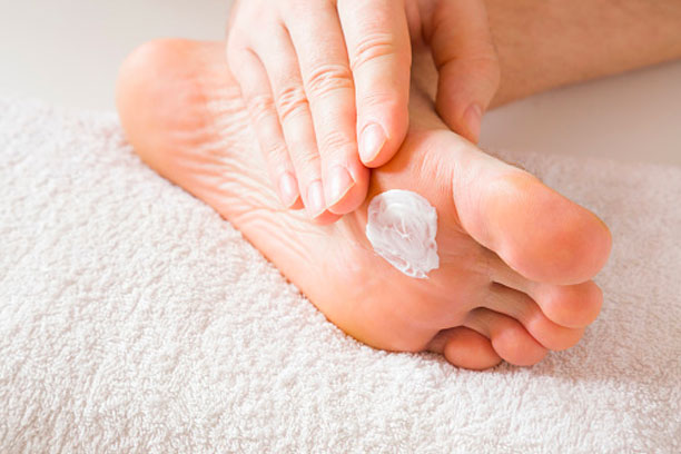 moisturizing feet with socks on